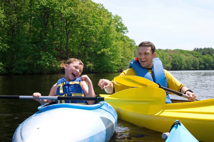 father_and_son_in_canoes